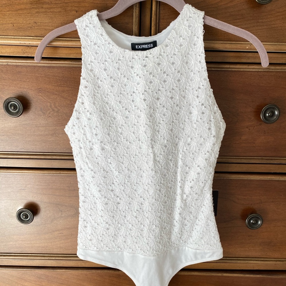 Brand new bodysuit with tags, never worn